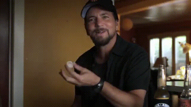 Eddie Vedder shows us what it’s like to tour with Cosmic Psychos. By putting a coin up his butt.